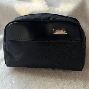 Tumi small travel case.